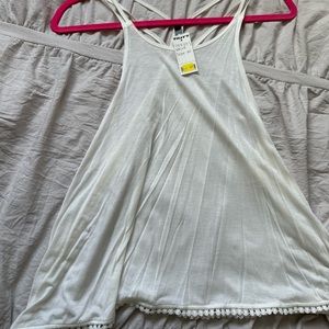 NWT white tank with detailing on bottom racerback detailing